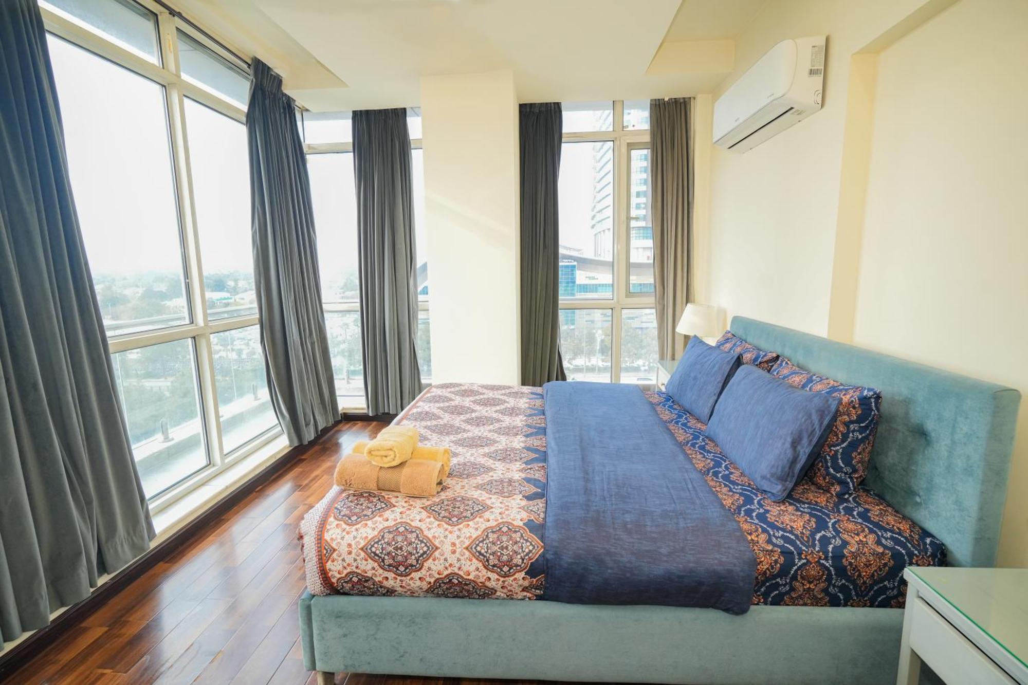 Cozy 2-Bedroom Apartment With King Beds, Balcony & Stunning Views At Elysium 伊斯兰堡 外观 照片